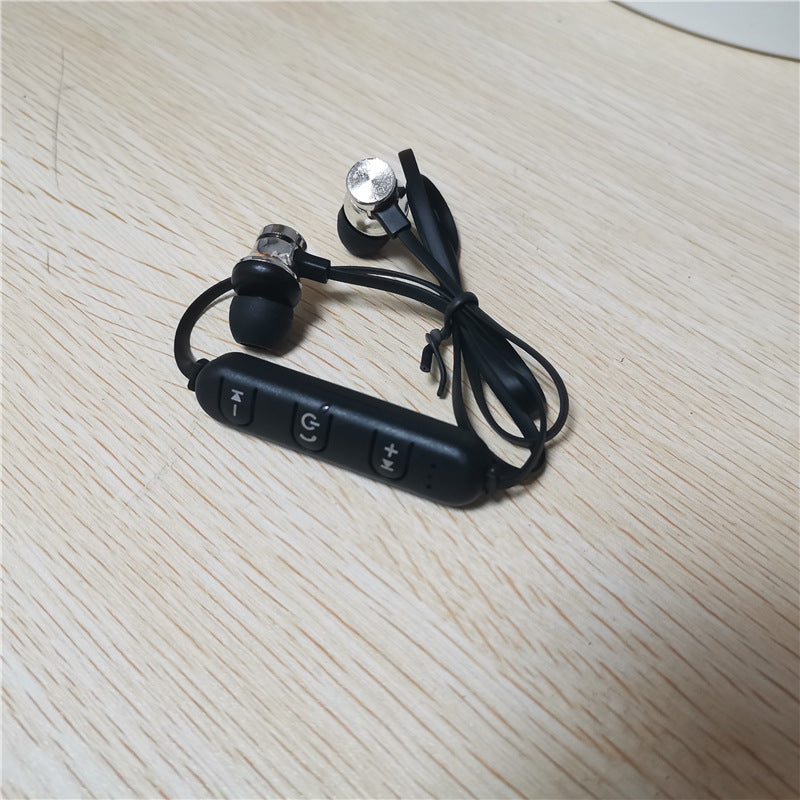 Silver Magnetic Wrap Around Earbuds On Table